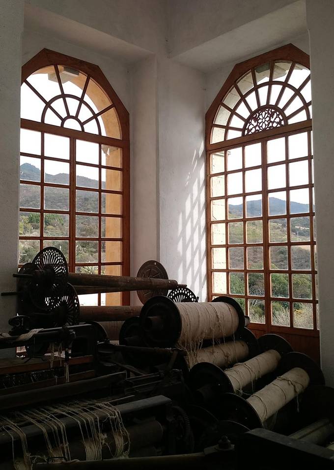 Big spools of cotton in the textile factory