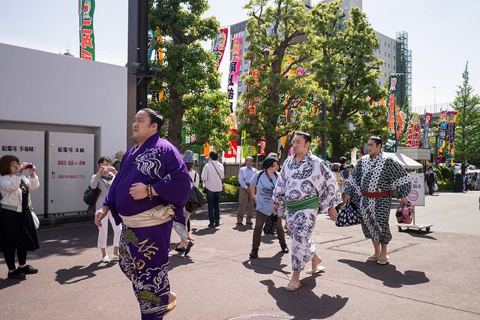 Sumo wrestlers entering the stadium