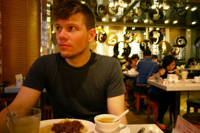 man in chinese restaurant in hong kong